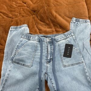 Light Blue Relaxed Jeans with Drawstring Waist and Tapered Leg